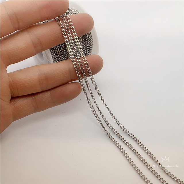 Link łańcucha metalowego ze stali nierdzewnej, srebrny, o szerokości 2.8 mm i grubości 1.3 mm, dostępny w długościach 5/10/20 m - idealny do tworzenia bransoletek, obojczyków i naszyjników - Wianko - 4