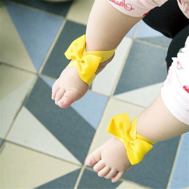 Stopy dla dzieci - akcesoria do fotografi noworodkowej z ozdobionymi łukami w jednolitym kolorze - Wianko - 10