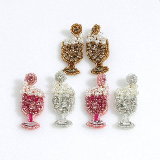 Białe kolczyki szampańskiego koloru perłowego z kryształkami w kolorze złota - kolekcja Dvacaman - Wianko - 14