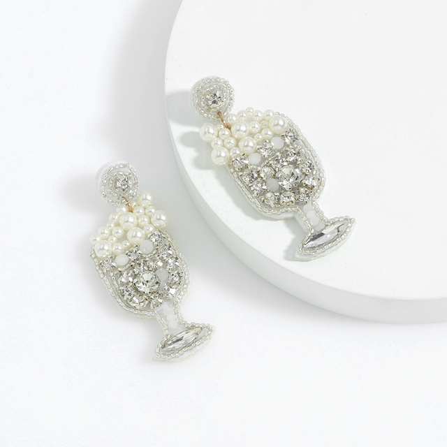Białe kolczyki szampańskiego koloru perłowego z kryształkami w kolorze złota - kolekcja Dvacaman - Wianko - 5