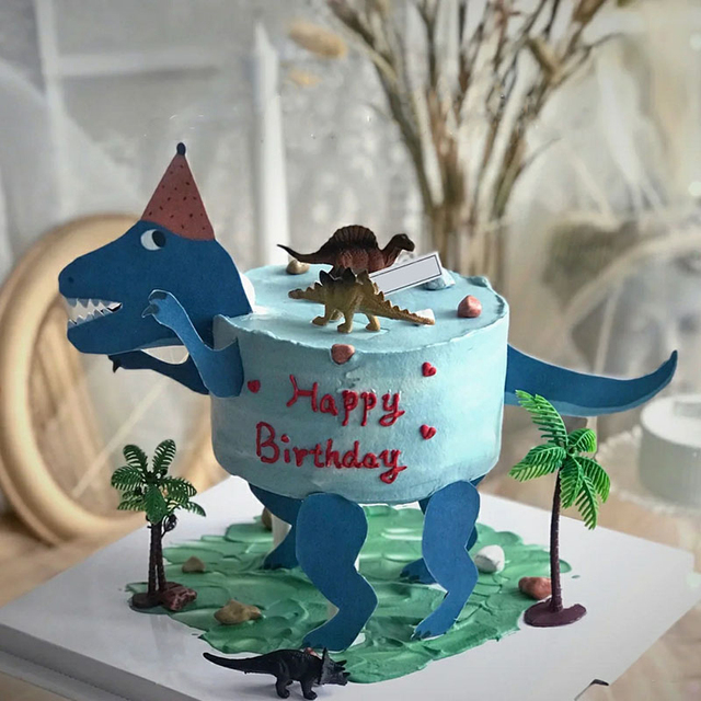 Ozdoba tortu dla dzieci - Niebieski pływający gigant Gartoon dinozaur z liśćmi kokosowymi - Wianko - 3