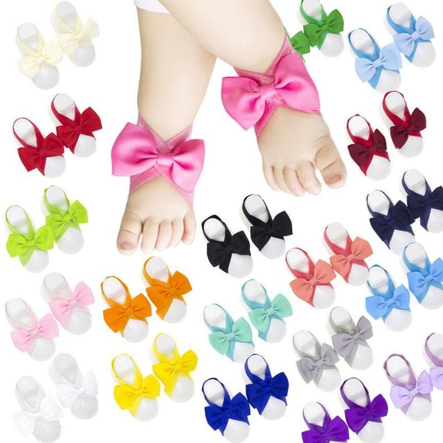 Buty dla noworodka 0-1 lat - kwiatowy wzór, jednolity kolor, ozdobione łukami - idealne do zdjęć i jako pamiątka - Wianko - 2