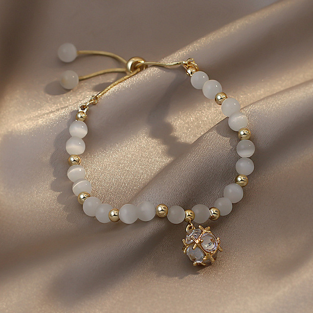 Elegancka, koreańska bransoletka z pereł dla kobiet - regulowana, złotego koloru - Wianko - 31