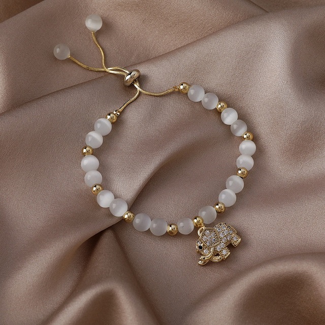 Elegancka, koreańska bransoletka z pereł dla kobiet - regulowana, złotego koloru - Wianko - 36