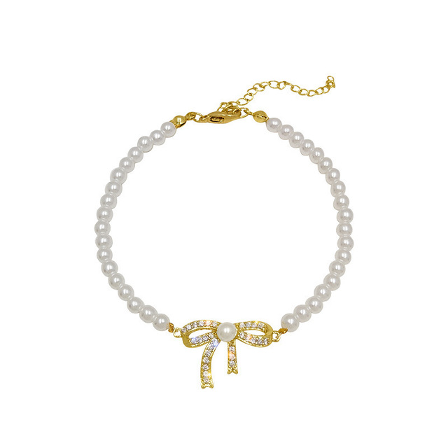 Elegancka, koreańska bransoletka z pereł dla kobiet - regulowana, złotego koloru - Wianko - 16