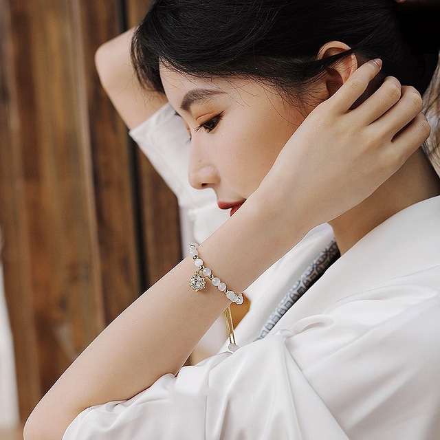Elegancka, koreańska bransoletka z pereł dla kobiet - regulowana, złotego koloru - Wianko - 32