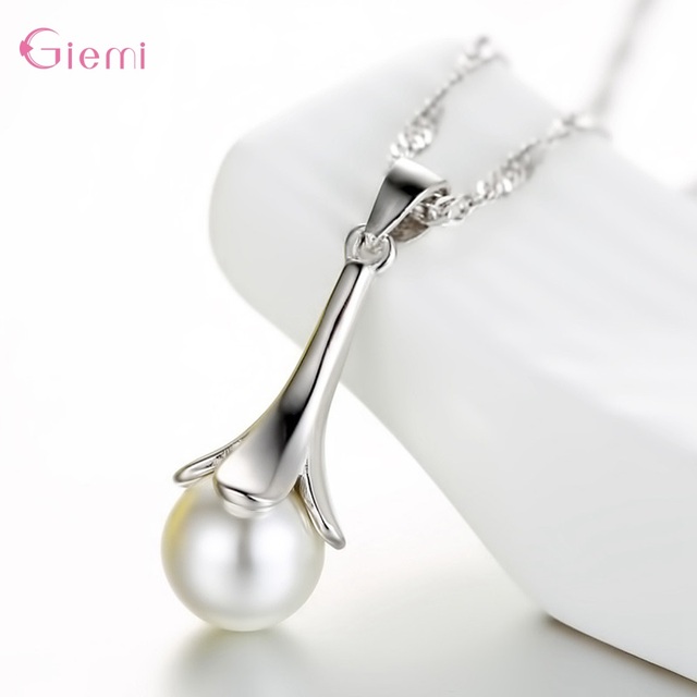 Zestaw biżuterii - nowoczesny naszyjnik z perłą i klasyczne kolczyki w kształcie kwiatu, wykonane ze srebra próby 925 - Wianko - 9