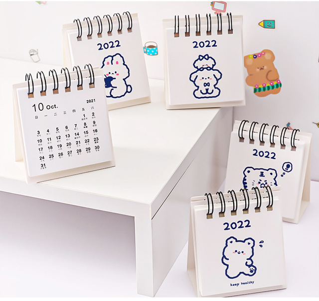 Roczny kalendarz biurkowy z królikiem i psem - Wianko - 11