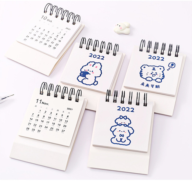 Roczny kalendarz biurkowy z królikiem i psem - Wianko - 12