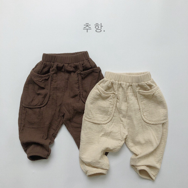 Spodnie dziecięce w nowym stylu: Jesień 2021, niemowlęce, chłopcy, dziewczynki, długie, bawełniane, luźne, rzepy, jednolity kolor - Wianko - 1