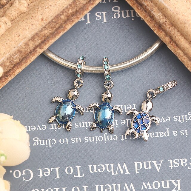 Bransoletka Pandora Charms z oryginalnym, srebrnym wisiorkiem, zdobiona niebieskim szkłem Murano, przedstawiająca żółwia morskiego - biżuteria DIY dla kobiet - Wianko - 6