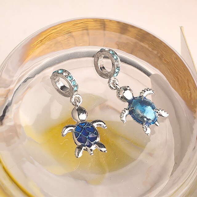 Bransoletka Pandora Charms z oryginalnym, srebrnym wisiorkiem, zdobiona niebieskim szkłem Murano, przedstawiająca żółwia morskiego - biżuteria DIY dla kobiet - Wianko - 5