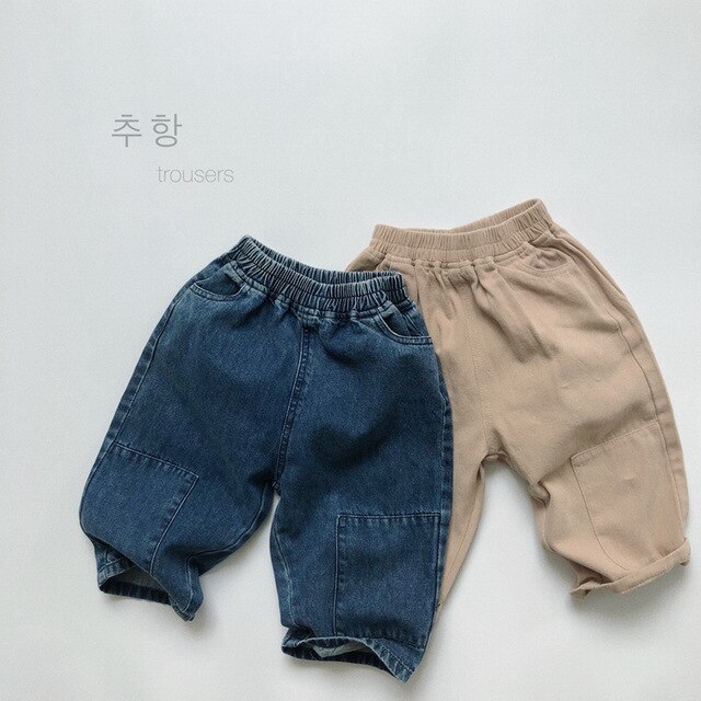 Jesień Jeansy koreańskiego stylu dla chłopców i dziewcząt - spodnie dziecięce z elastycznym paskiem - Wianko - 1