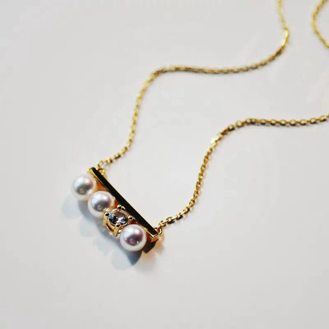 Nowoczesny naszyjnik z wisiorkiem Balance Beam dla kobiet z imitacją kamienia CZ w kształcie perły - elegancka biżuteria na imprezę i wyjątkowy prezent - Wianko - 1