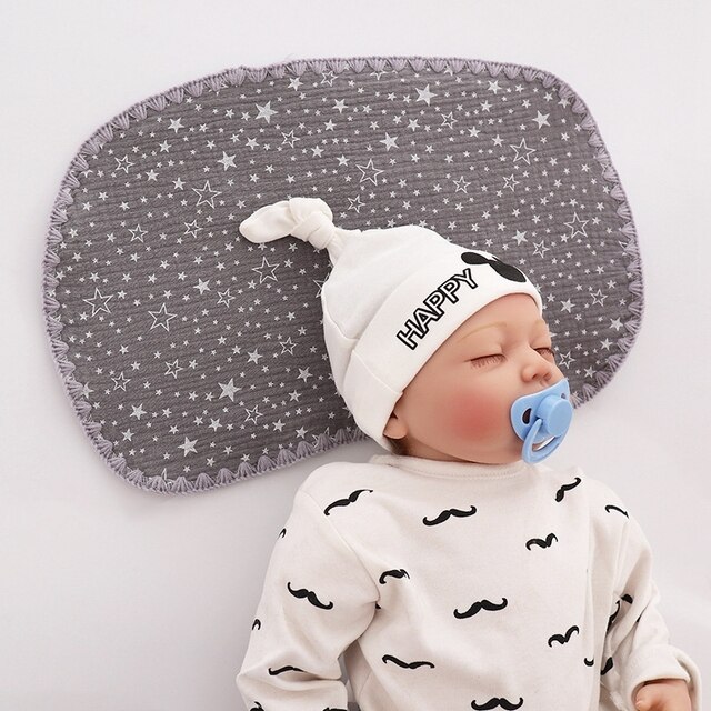 Poduszka Anti Roll dla niemowląt - kształtująca maluchowi doskonałą pozycję podczas snu, zapobiega płaskiej głowie i absorbuje pot - ochrona i komfort dla noworodka - Wianko - 1